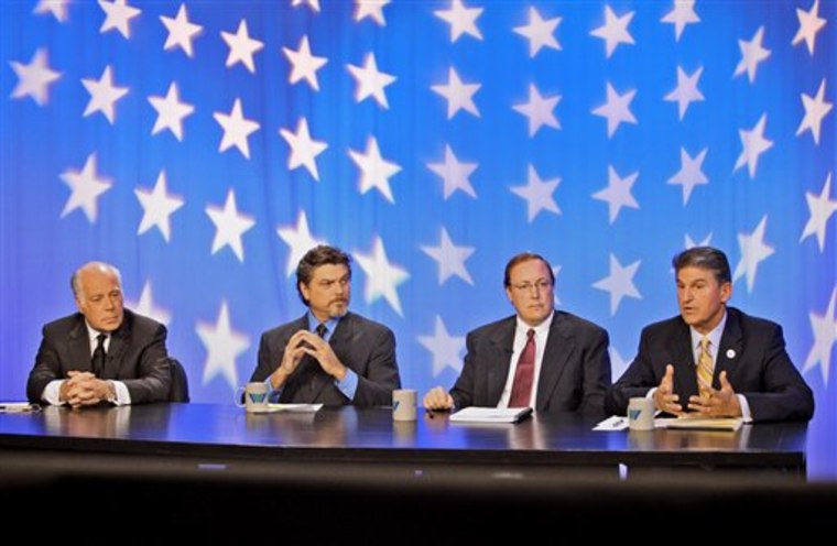 ** ADDS MONDAY ** West Virginia senatorial candidates Republican John Raese, left, Mountain Party candidate Jesse Johnson, second from left, and Constitutional Party candidate Jeff Becker, listen to West Virginia Governor Joe Manchin, right, speak during a Senate debate in the studios of West Virginia Public Broadcasting in Morgantown, W.Va. on Monday, Oct.  18, 2010.  (AP photo/David Smith)